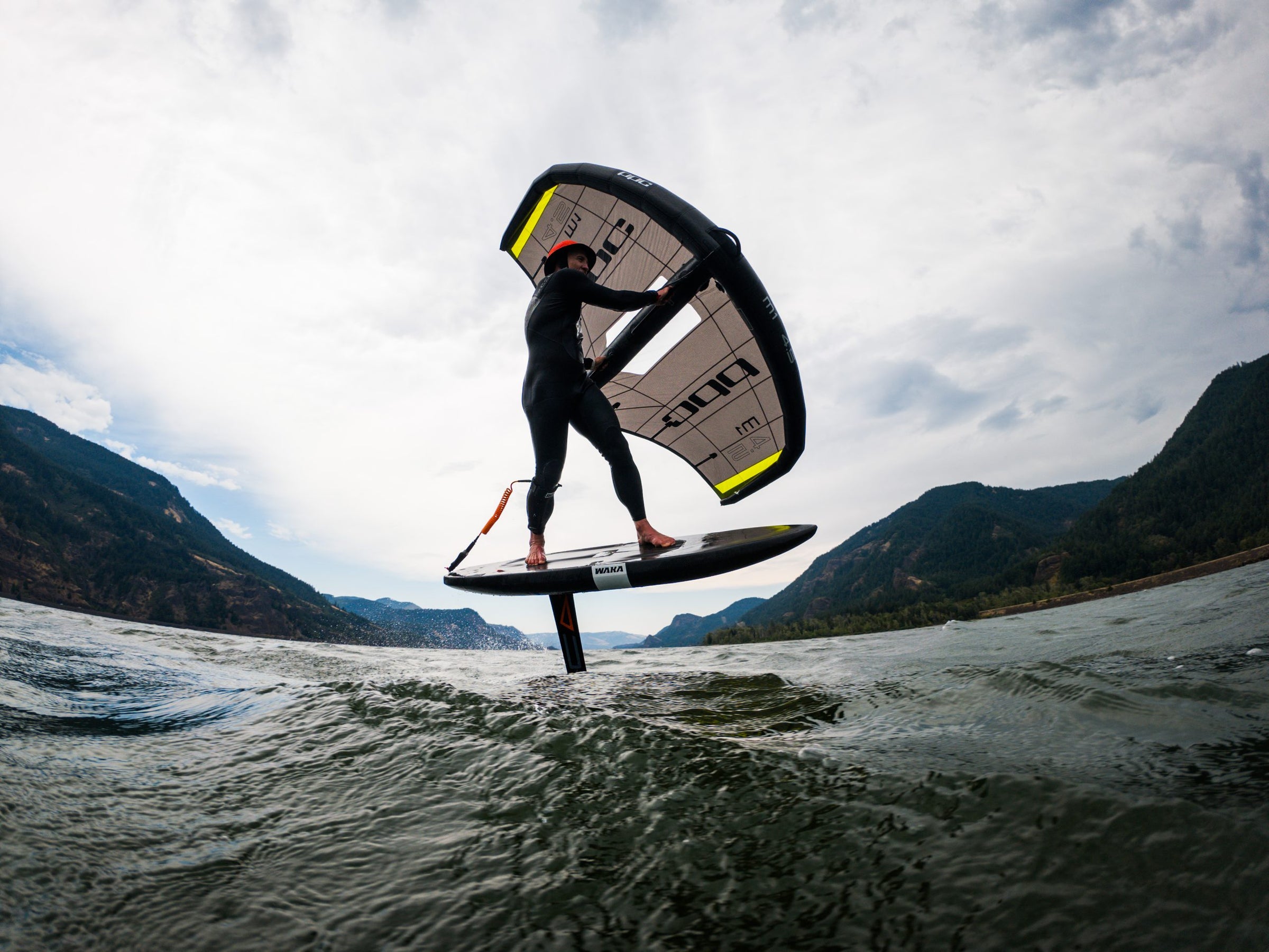 Wing foiling at water level with a Duotone wing