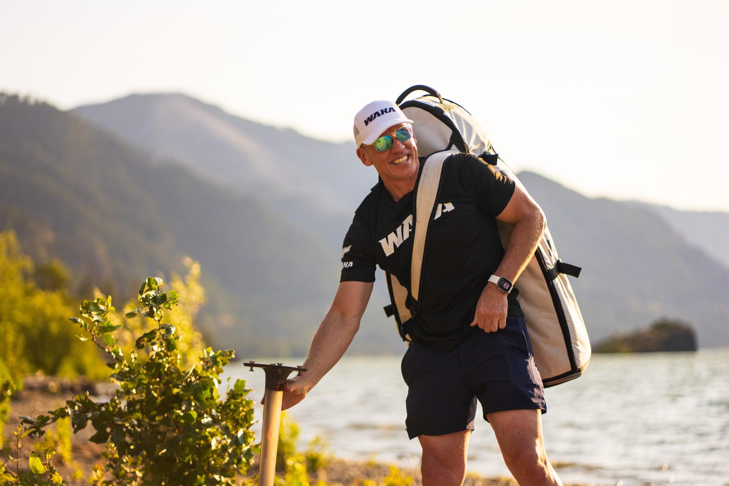 Rider with a WAKA board bag and foil